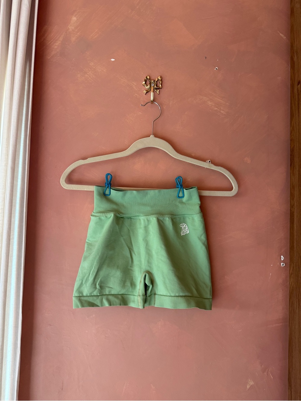 Green woman’s  Athletic Shorts with Small White Logo